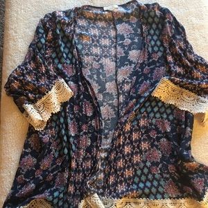 Loose fitting shrug with lace
